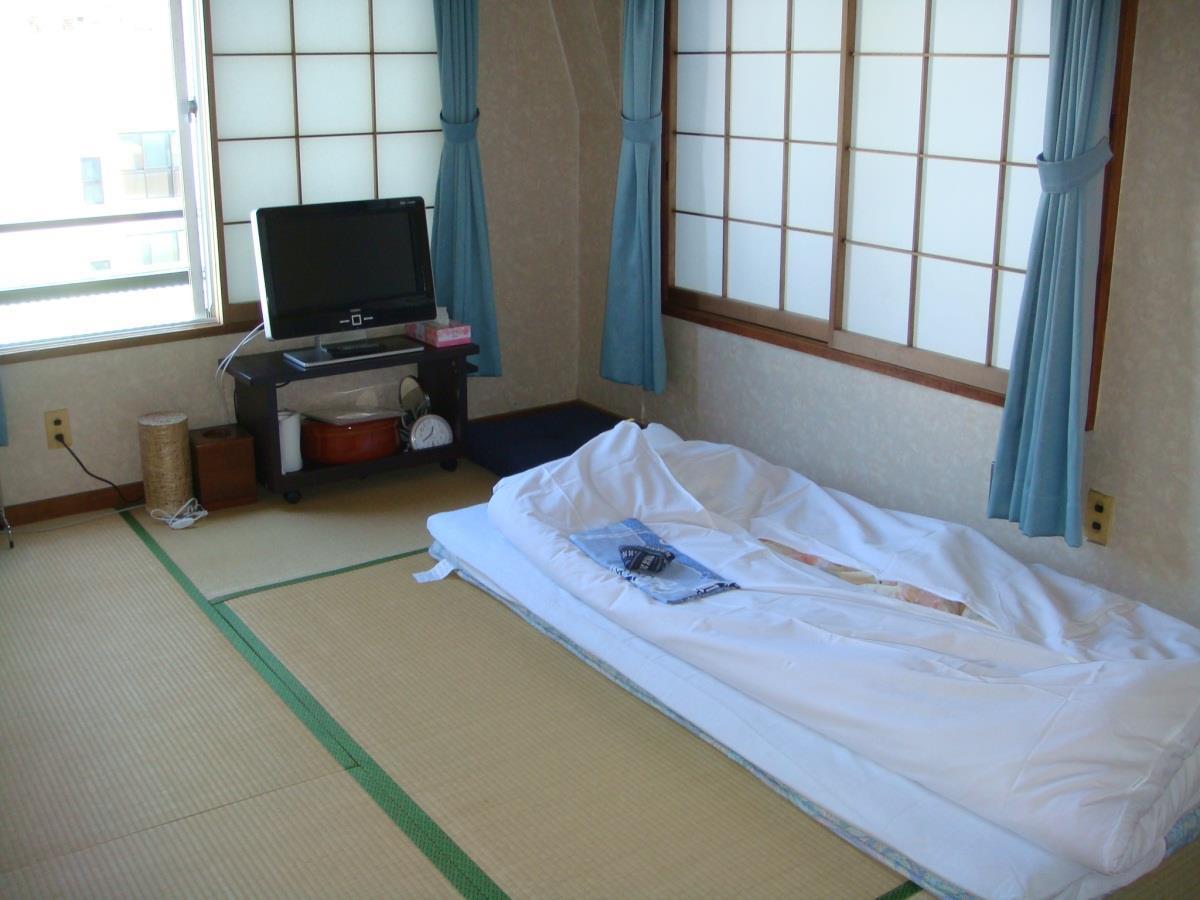 Ryokan Mikawaya Токио Экстерьер фото